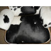 Classic Lounge Chair And Ottoman In Cowhide Leather