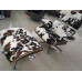 Classic Lounge Chair and Ottoman in Tri-Color Pony Skin Leather Classic Lounge Chair and Ottoman in Tri-Color Pony Skin Leather